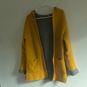 Mustard yellow, and grey wool sweater. Hooded with great deep pockets